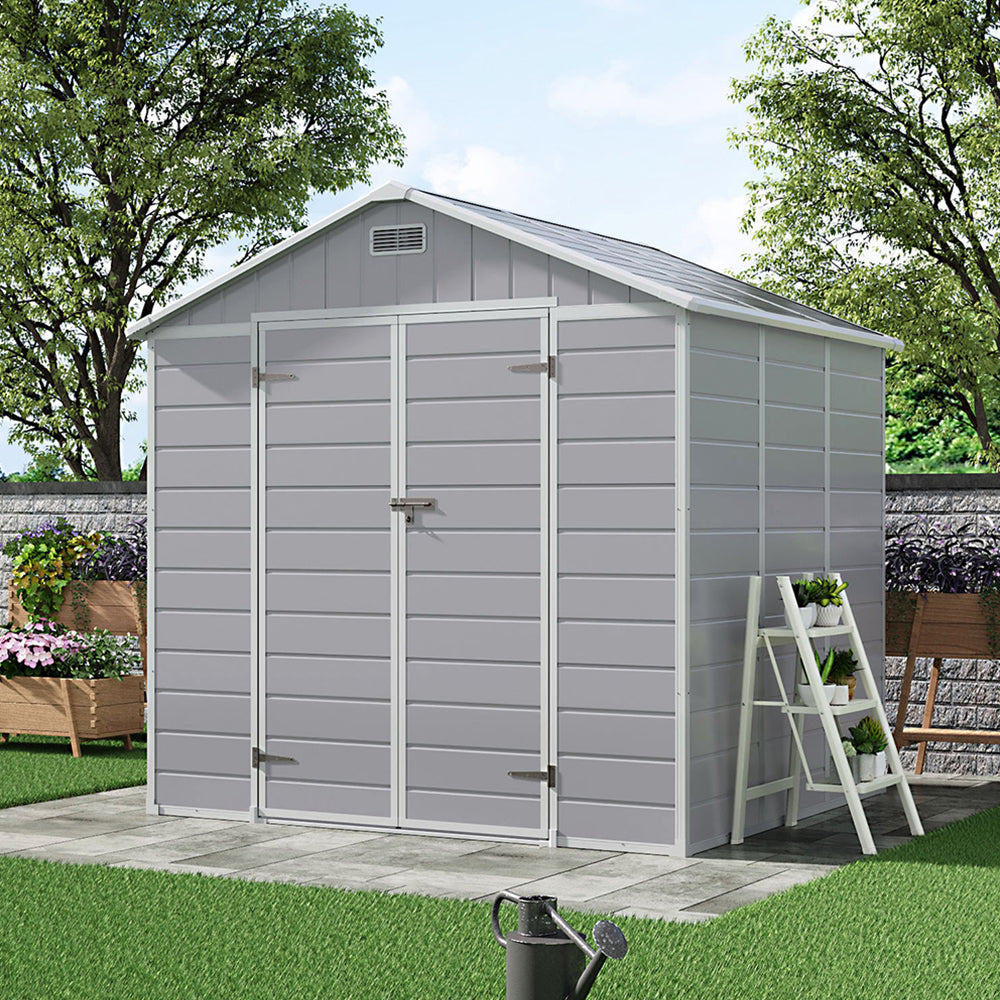 8x6ft grey plastic garden storage shed with gable roof and double doors – ideal for storing tools and equipment outdoors